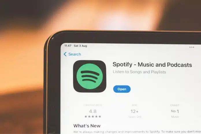 Aplicativo do Spotify em dispositivo criptomoedas bitcoin blockchain