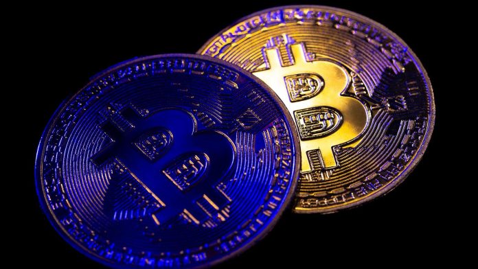 Bitcoin azul e dourado em destaque preços