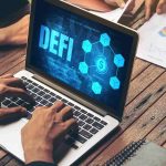 Computador com nome DeFi Analistas do BTG Pactual divulgam as tendências de DeFi do primeiro semestre de 2026