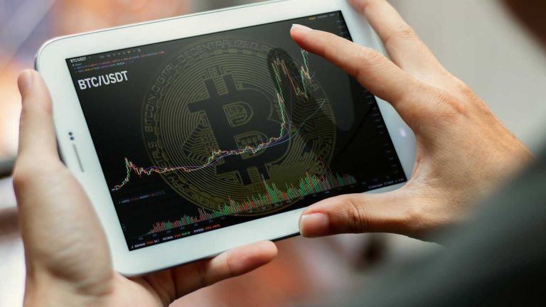 Bitcoin em tela de tablet no par USDT