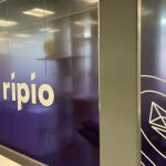 Imagem de banner da Ripio em parede